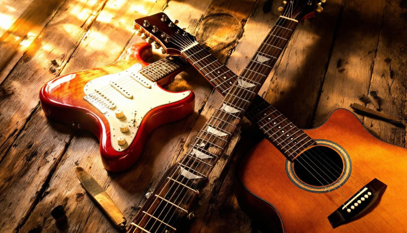 Comment choisir entre guitare électrique et folk pour débutants ?